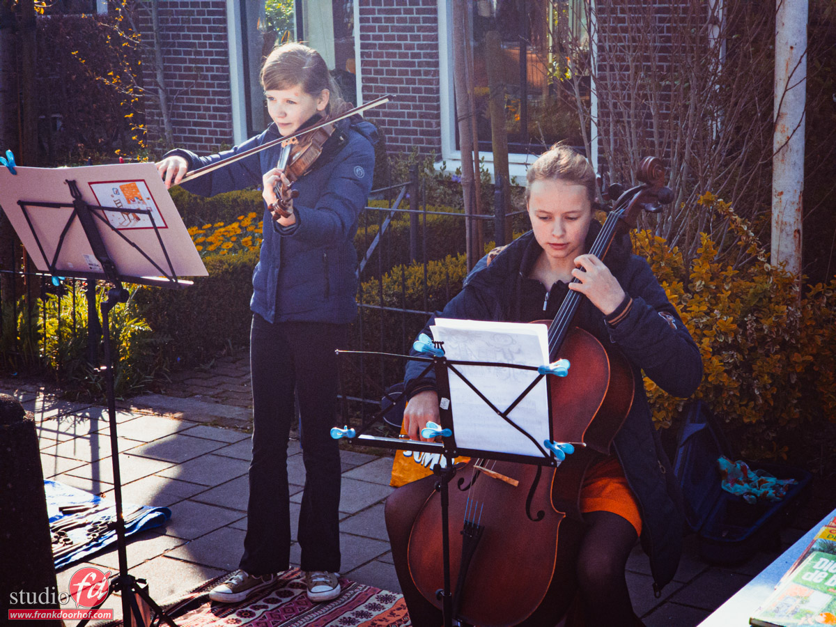 Kingsday 2023. Young musicians, and of course, a hat for some spare change